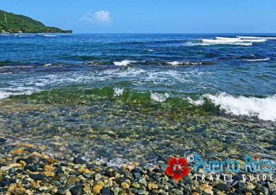 Beachcombing for beach pebbles at Playa Escondida - Patillas, Puerto Rico